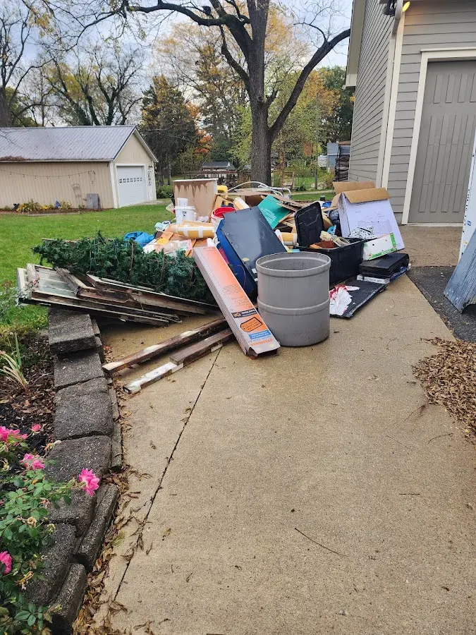 Dumpster being loaded with debris for 3 Yard Dumpster Rental in Lower Windsor